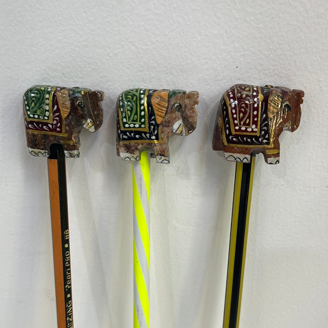 Stone carved Pencil tops