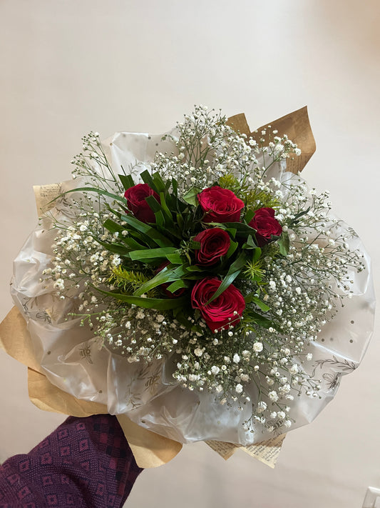 Roses and babies breath mesh bouquet