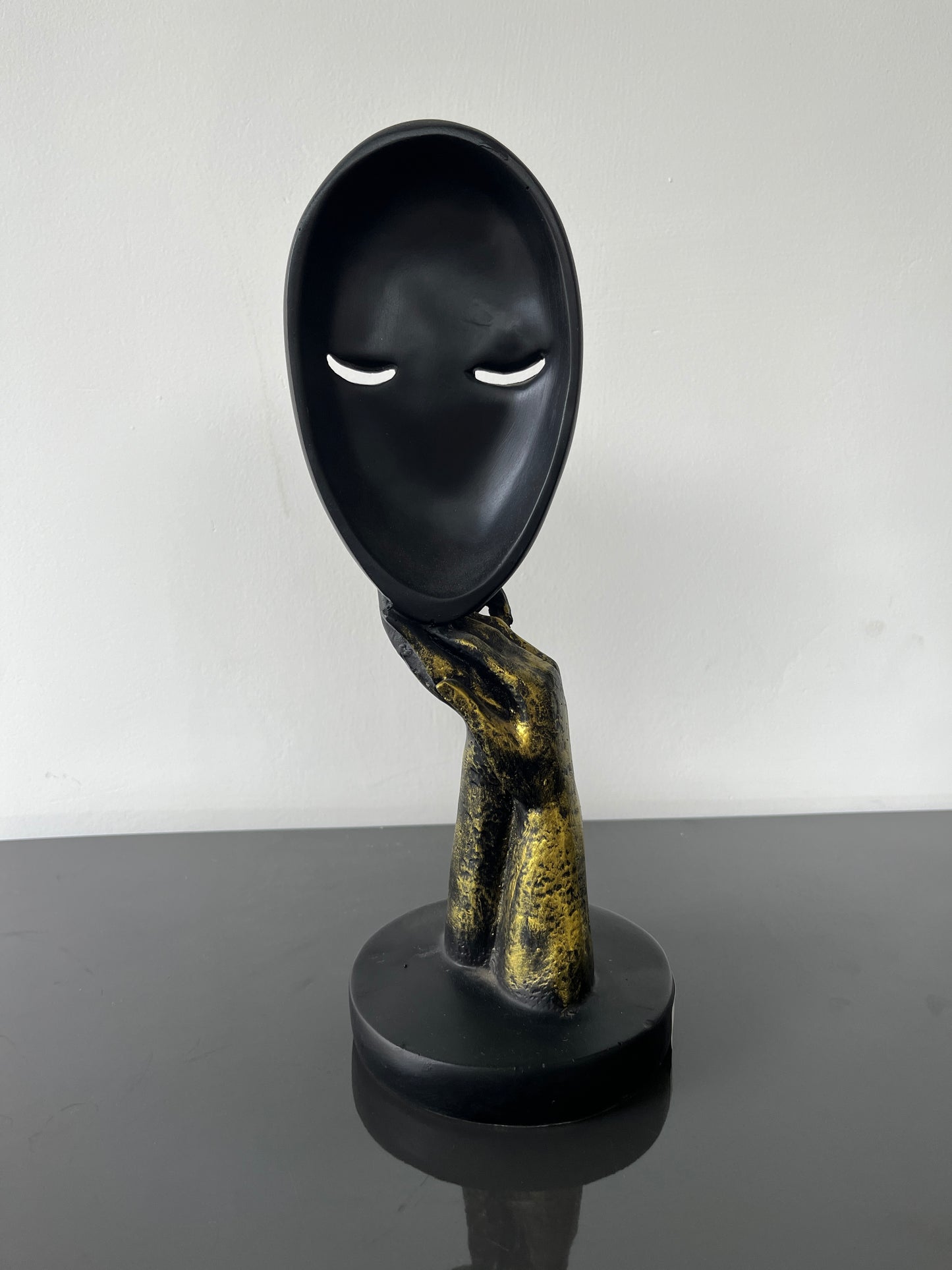 Wondering Face Statue