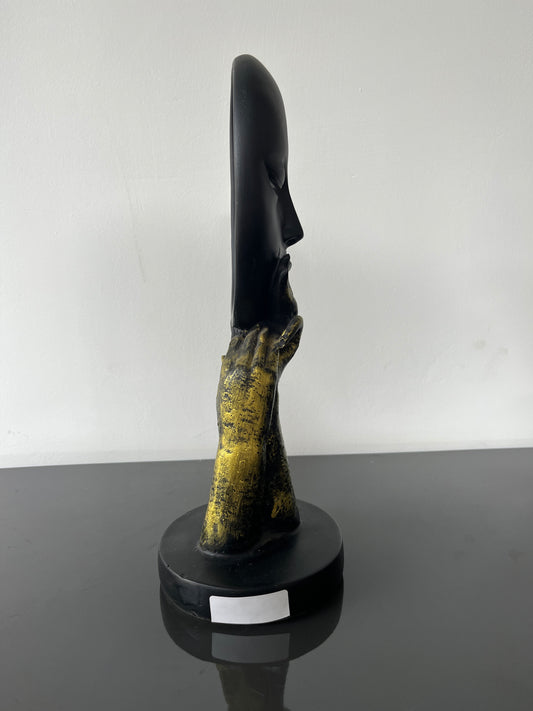 Wondering Face Statue