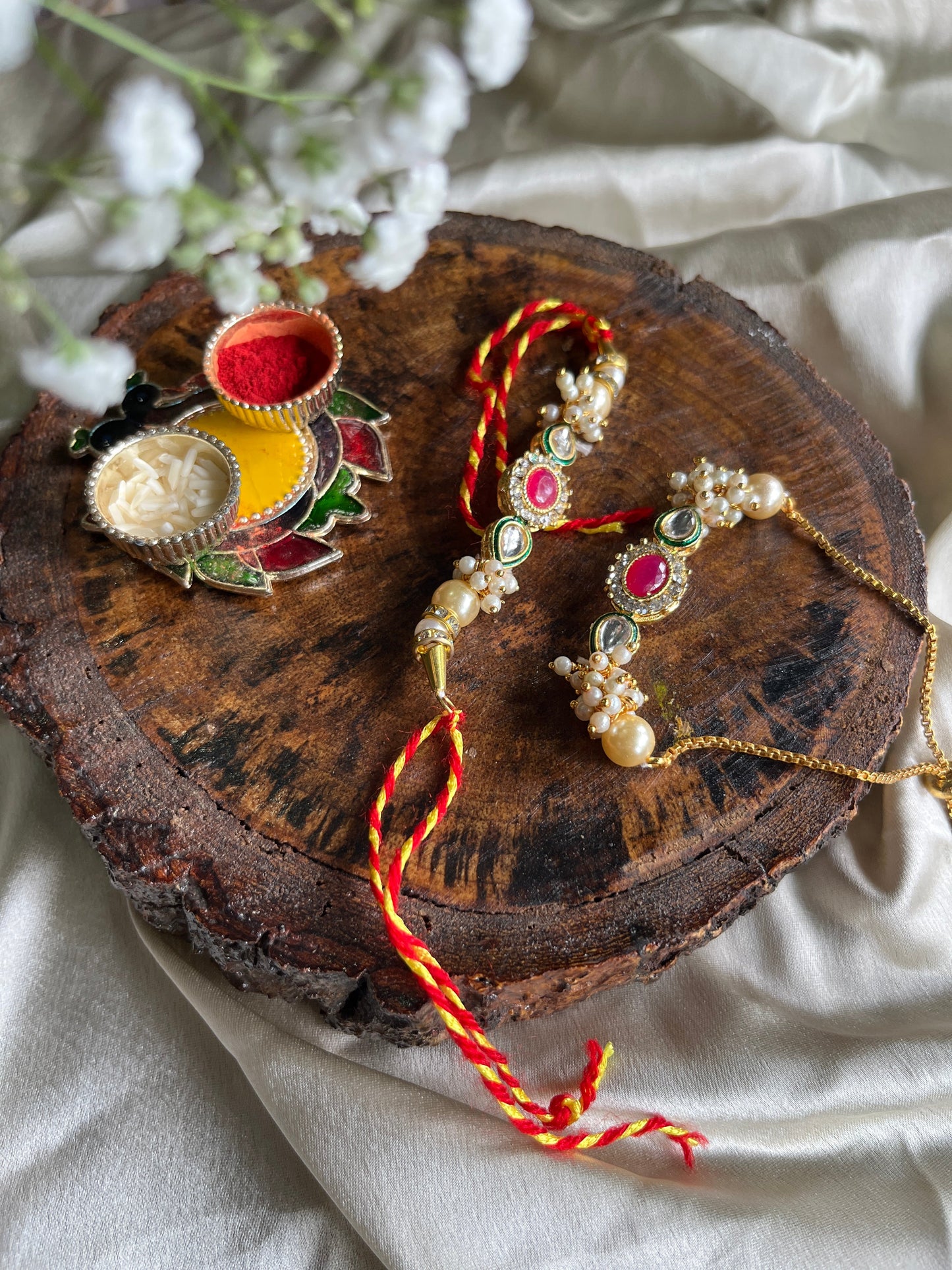 Redstone Ruby Rakhi Lumba set Florenzaa